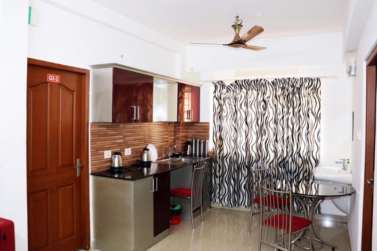 Hotel Uthradam Towers Thiruvananthapuram Esterno foto