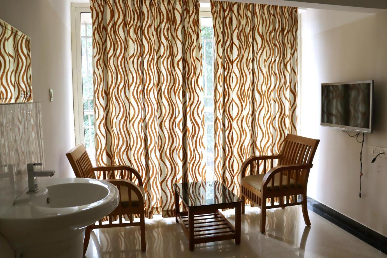 Hotel Uthradam Towers Thiruvananthapuram Esterno foto